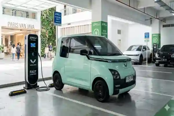 Sewa mobil listrik Wuling Air EV mint green di area parkir SPKLU Mall Paris Van Java (PVJ) Bandung.